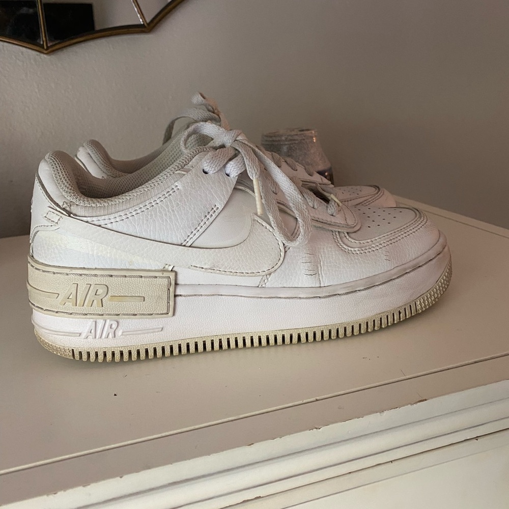 Nike White Sneakers with Black Logo
